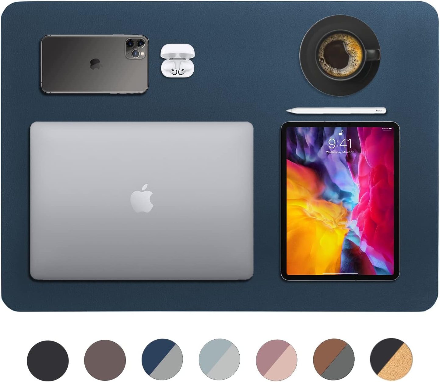 Smaller dark blue desk mat with a laptop, a tablet, a phone, and a coffee mug.