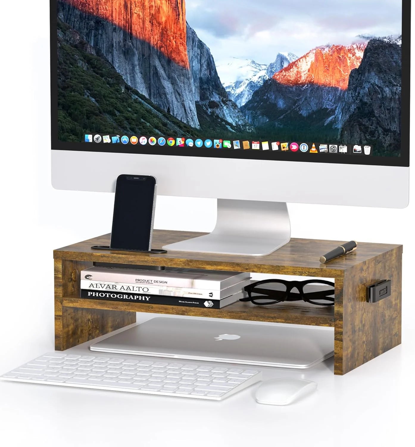 Vintage Brown Monitor Stand with a monitor at the top, a phone, a calculator, and some books.