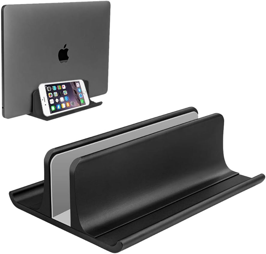 Vertical Laptop Stand  with a phone and a white background.