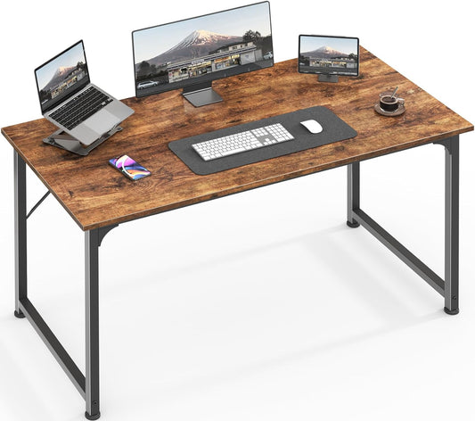 Wooden rectangular desk with a computer and 2 screens on top.